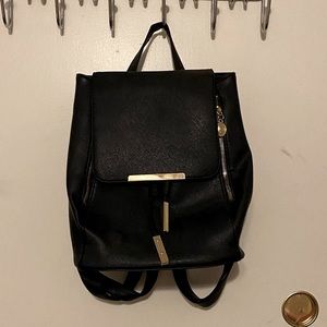 ($10) Black Backpack